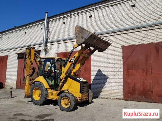 Экскаватор-погрузчик Caterpiller Барнаул - изображение 1