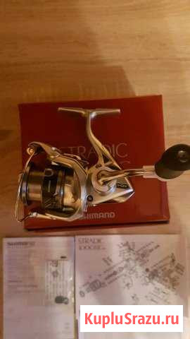 Shimano 15 Stradic 1000HG Луга - изображение 1