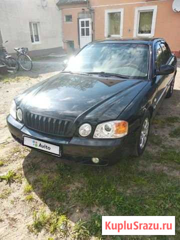 KIA Magentis 2.5 AT, 2003, 200 000 км Янтарный - изображение 1
