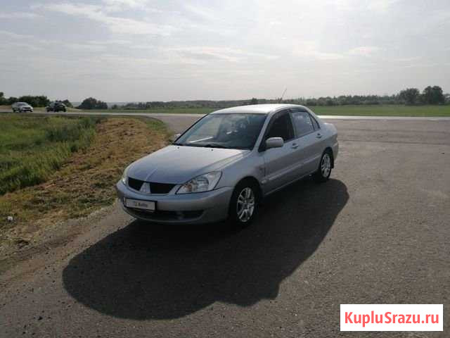 Mitsubishi Lancer 1.6 МТ, 2006, 206 620 км Разумное - изображение 1