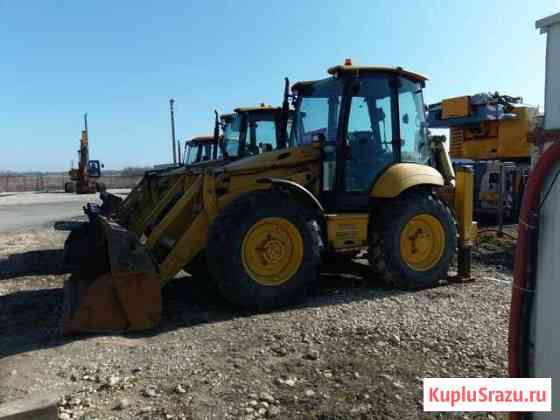Экскаватор - погрузчик komatsu WB93S 2012 г. в Санкт-Петербург