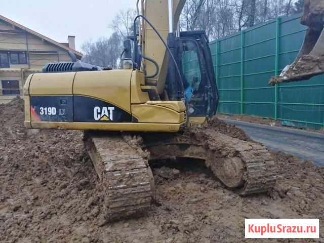 Гусеничный экскаватор Caterpillar 319DLN Москва - изображение 1