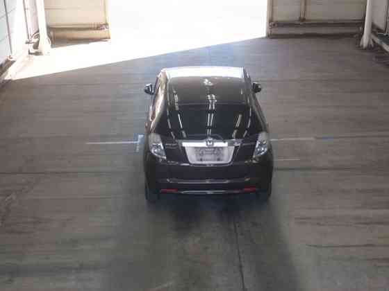 Хэтчбек гибрид Honda Fit Hybrid кузов GP1 модификация Hybrid 10TH Anniversary Москва