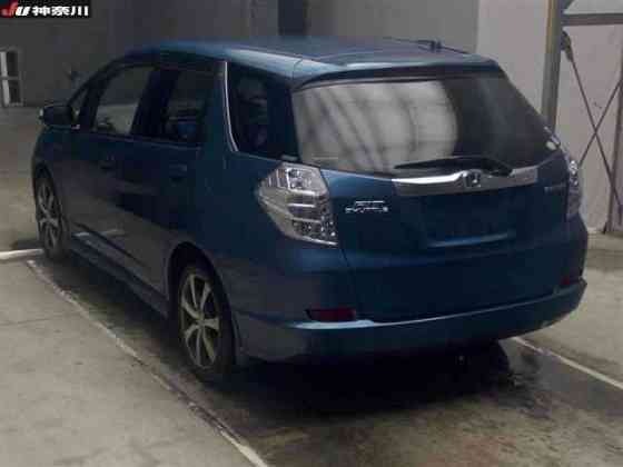 Универсал гибрид Honda Fit Shuttle Hybrid кузов GP2 модификация Hybrid Smart Edition Москва