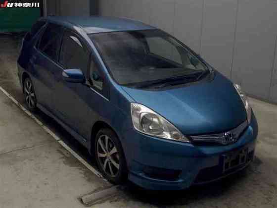 Универсал гибрид Honda Fit Shuttle Hybrid кузов GP2 модификация Hybrid Smart Edition Москва