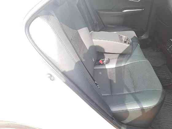 Седан гибрид Toyota Camry Hybrid кузов AVV50 модификация Hybrid Leather Package Москва
