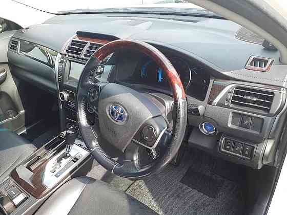Седан гибрид Toyota Camry Hybrid кузов AVV50 модификация Hybrid Leather Package Москва