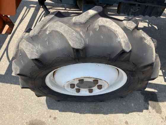 Минитрактор с/х Kubota Sunshine L1 Series L1-33D 4х4 крыша КУН ковш фреза наработка 738 мч Москва