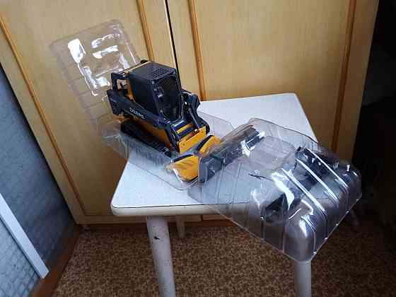 Модель Фронтальный погрузчик John Deere 323 D Саранск