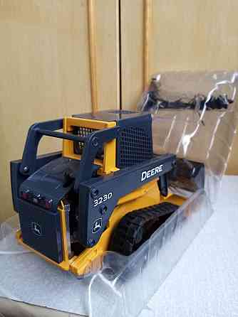 Модель Фронтальный погрузчик John Deere 323 D Саранск